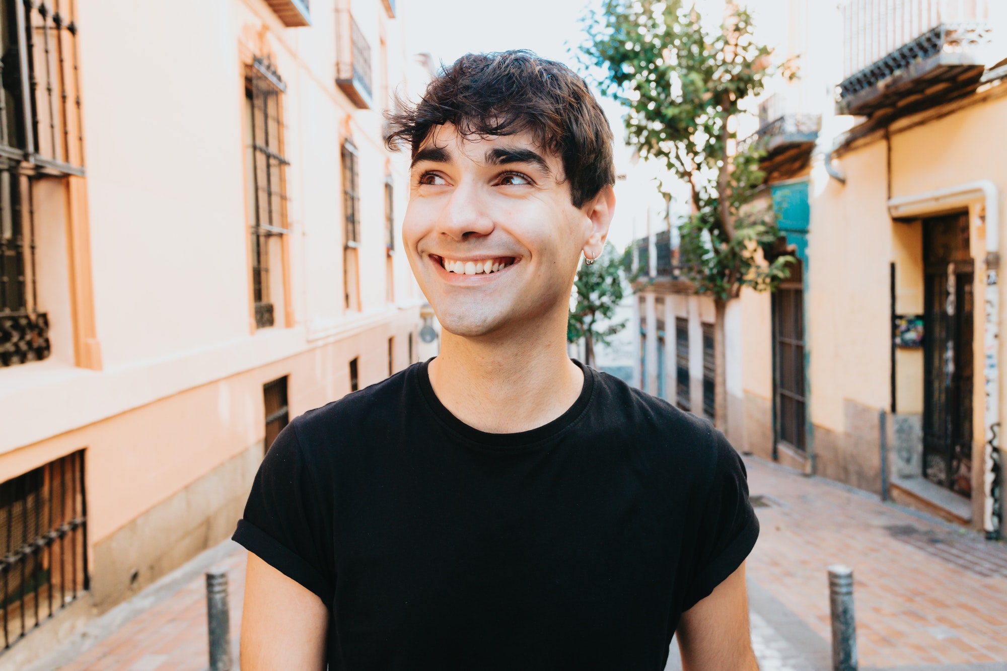 handsome-man-outdoors-portrait-man-smiling-looking-in-the-camera.jpg